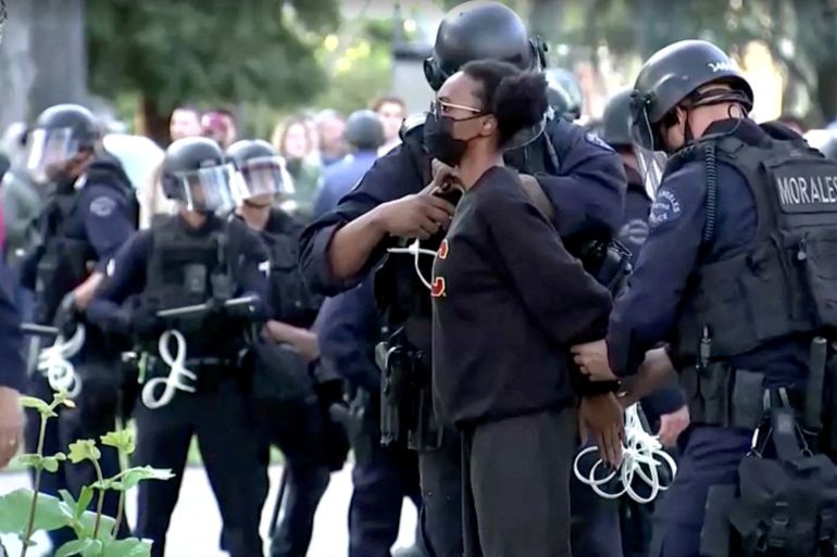 Police arrest a pro-Palestinian protester at USC campus in Los Angeles, California, U.S., April 24, 2024, in this still image taken from video. REUTERS/Reuters TV REFILE - CORRECTING DATE FROM "APRIL 25" TO "APRIL 24" AND CREDIT FROM "VIDEO OBTAINED BY REUTERS" TO "REUTERS TV