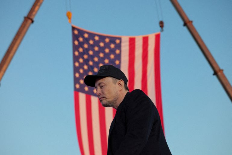 FILE PHOTO: Tesla CEO and X owner Elon Musk attends a rally for Republican presidential nominee and former U.S. president Donald Trump, at the site of the July assassination attempt against Trump, in Butler, Pennsylvania, U.S., October 5, 2024. REUTERS/Brian Snyder/File Photo