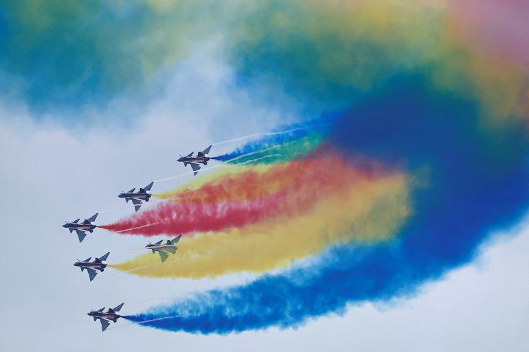 Aircraft of the Chinese air force's Bayi aerobatic team perform at the China International Aviation and Aerospace Exhibition