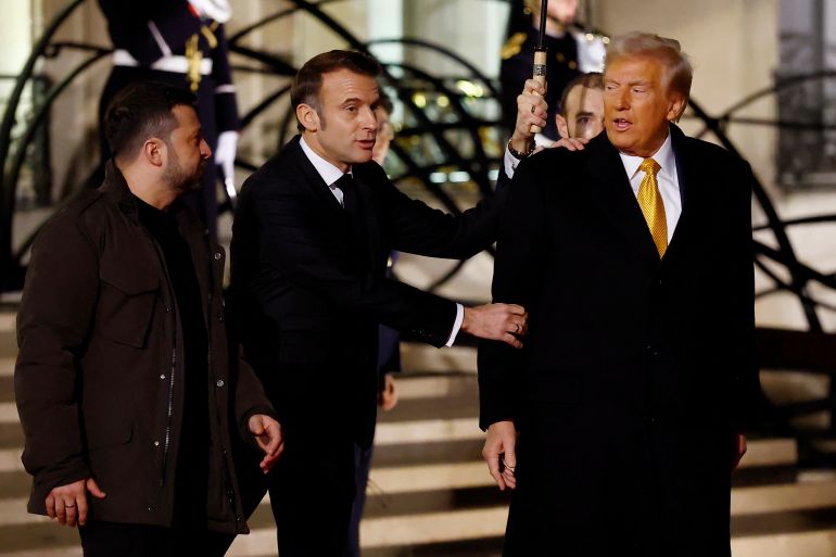 French President Emmanuel Macron accompanies US President-elect Donald Trump and Ukraine's President Volodymyr Zelenskyy
