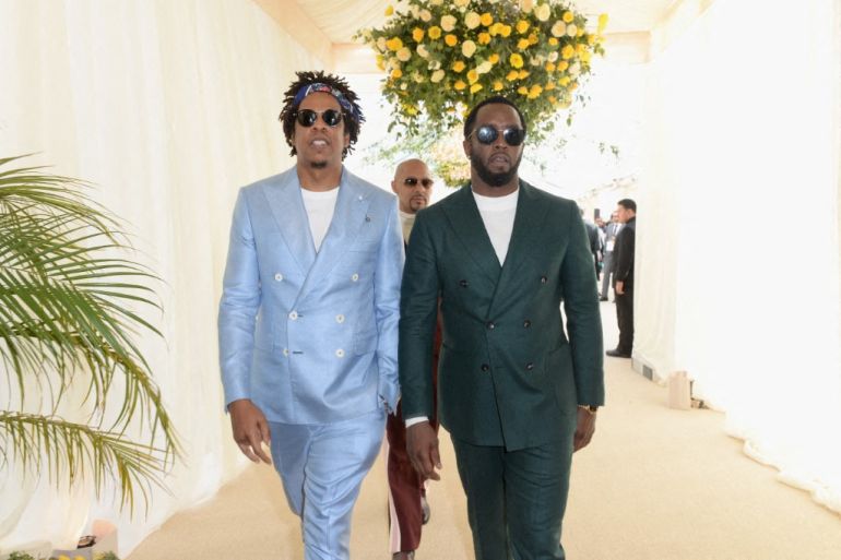 Artists Jay-Z, left, and Diddy attend an event in Los Angeles, California
