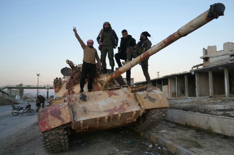 Syrian opposition fighters sweep into Aleppo