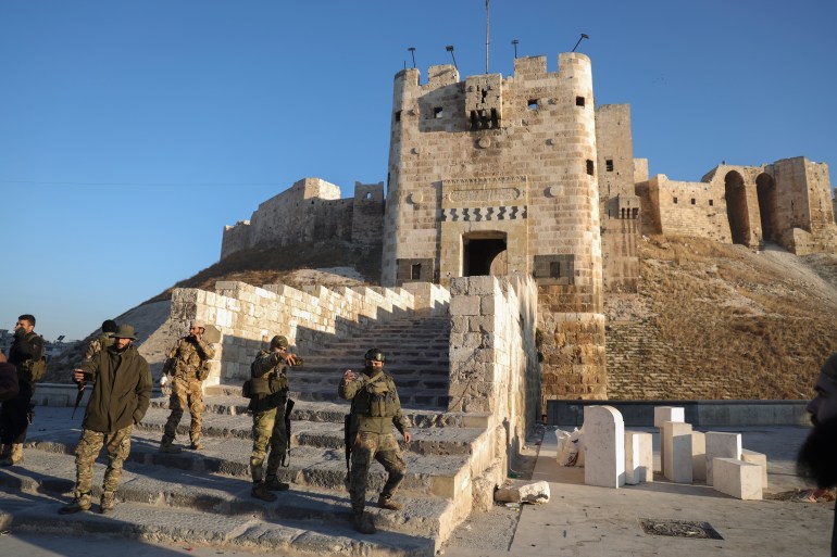 Syrian opposition fighters sweep into Aleppo