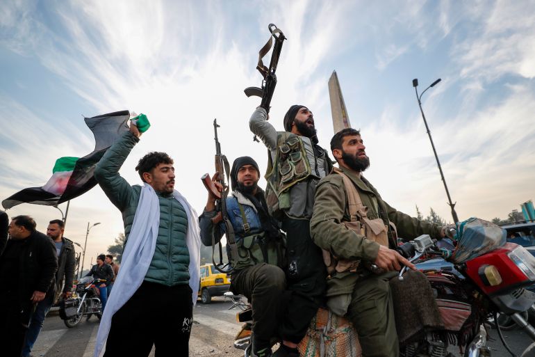 Syrian opposition fighters celebrate